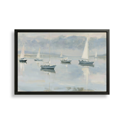 a serene scene of sailboats gently floating on a calm body of water, with a cloudy sky in the background.