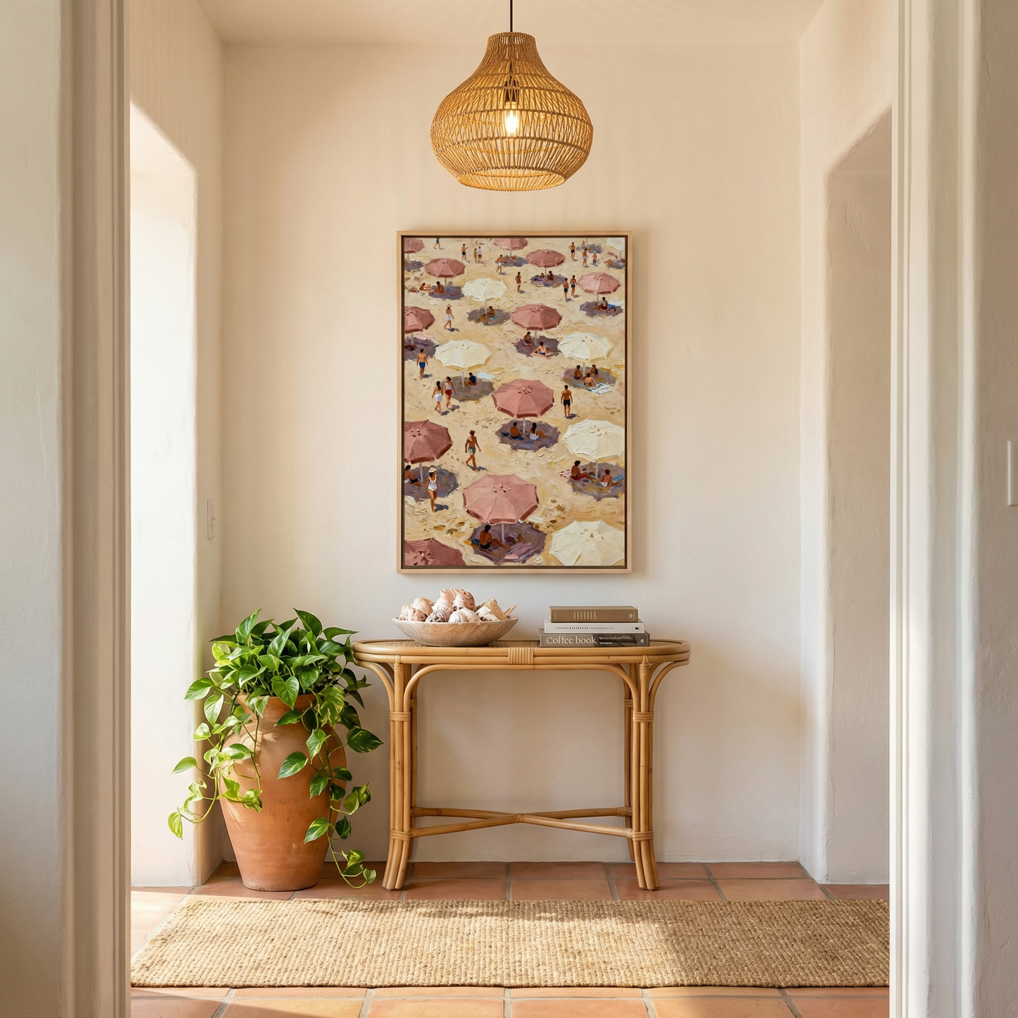 a cozy and inviting hallway with a wooden console table, a potted plant, and a hanging woven light fixture. Above the console table, there is a framed picture of a beach scene with umbrellas and people. The hallway is well-lit, with natural light coming in from a window on the left side.