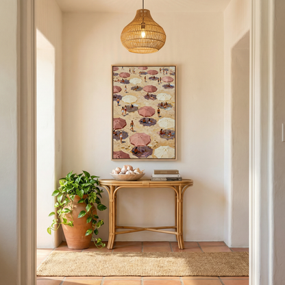 a cozy and inviting hallway with a wooden console table, a potted plant, and a hanging woven light fixture. Above the console table, there is a framed picture of a beach scene with umbrellas and people. The hallway is well-lit, with natural light coming in from a window on the left side.