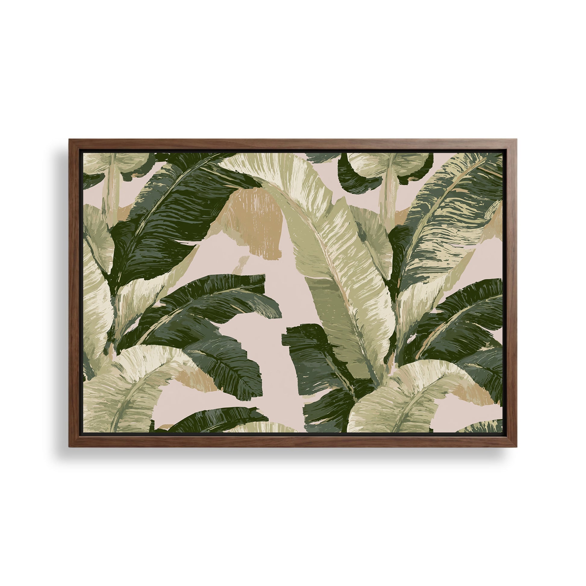 a large, framed print of a tropical plant with large, green leaves. The print has a predominantly green and white color scheme, with some brown accents. The print is displayed on a white wall, and it appears to be a framed artwork.