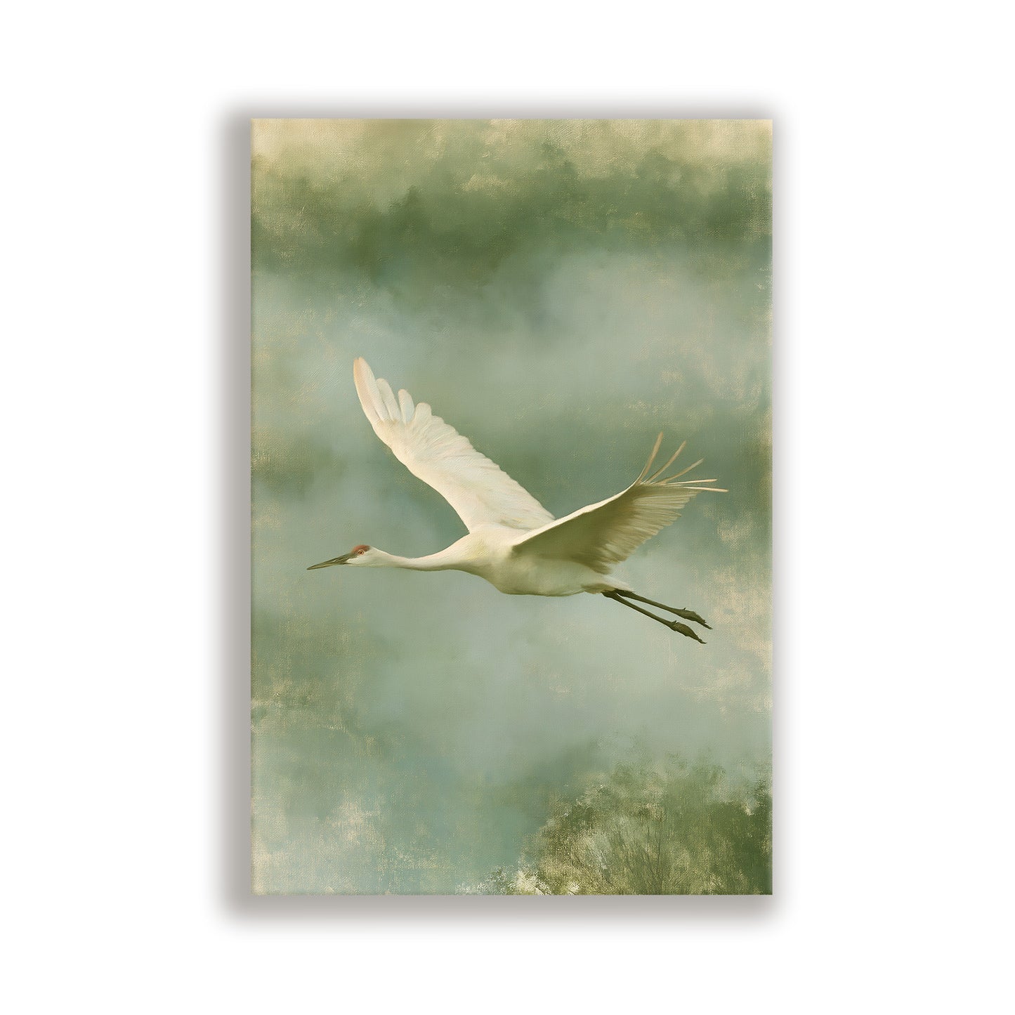 A white crane gracefully soars through the sky, its wings spread wide as it glides effortlessly above the water.