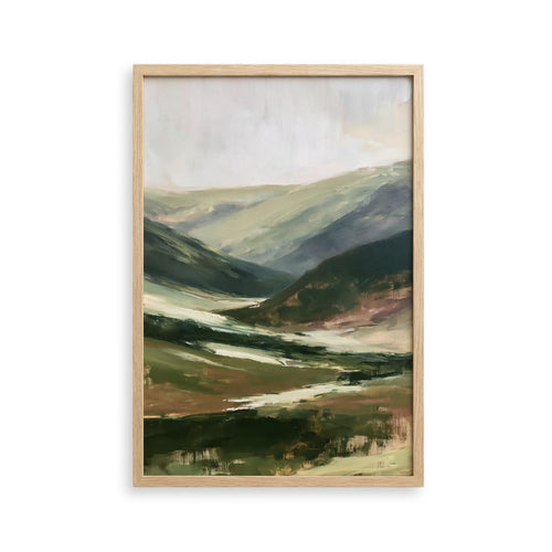 The image is a framed landscape painting depicting a serene mountain scene with rolling hills, lush greenery, and a winding path.