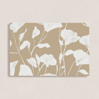 Driftleaf canvas print with white floral silhouettes on beige background, minimalist botanical wall art.