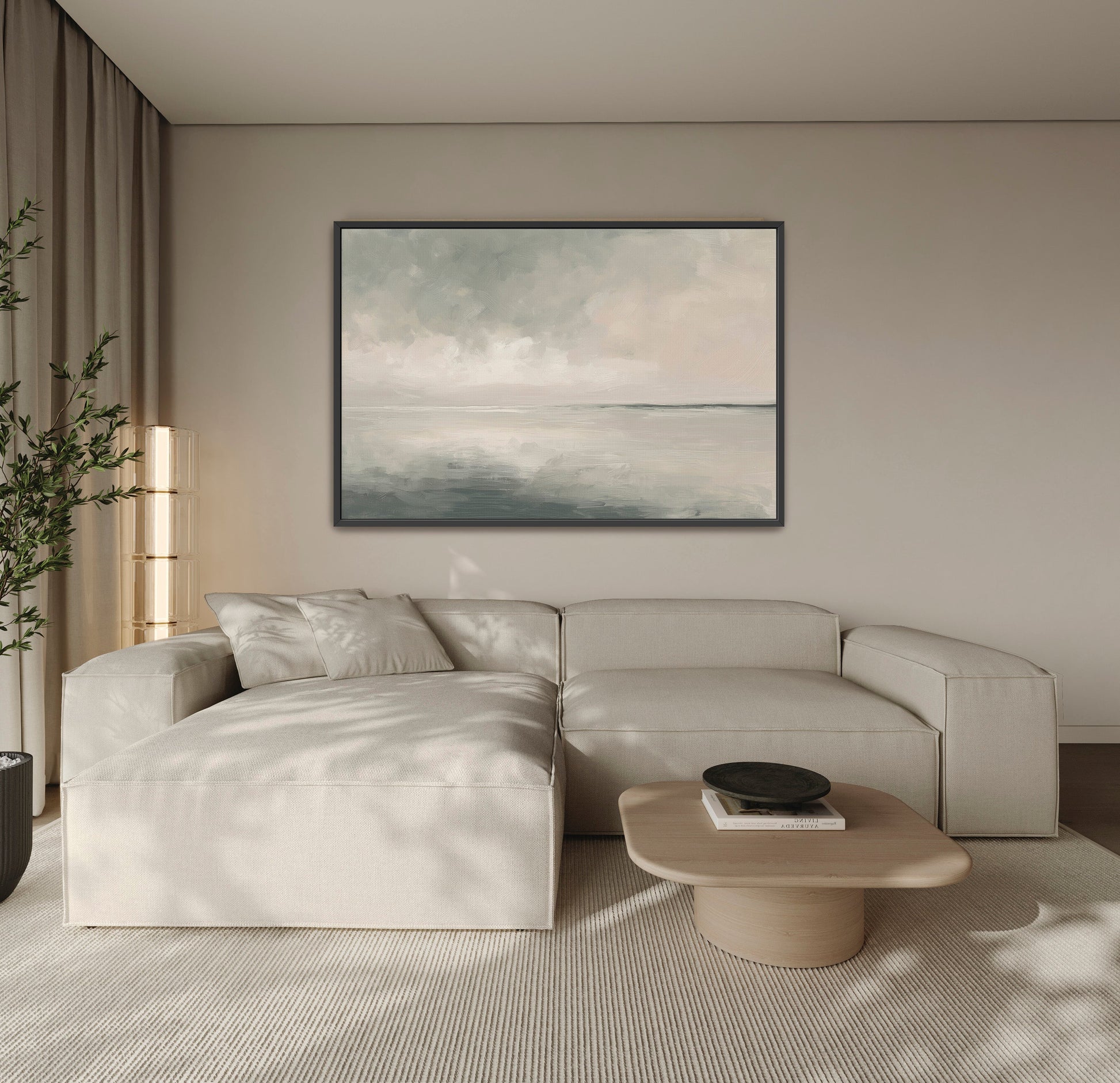 Aure Cavas Print abstract seascape artwork in black frame above beige sectional sofa in modern living room