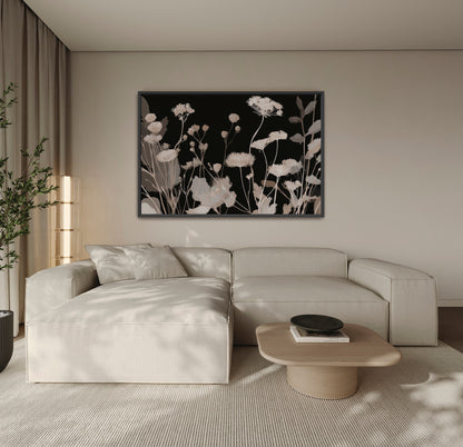 Shadow Bloom Canvas Art featuring neutral wildflowers on black background in modern living room setting