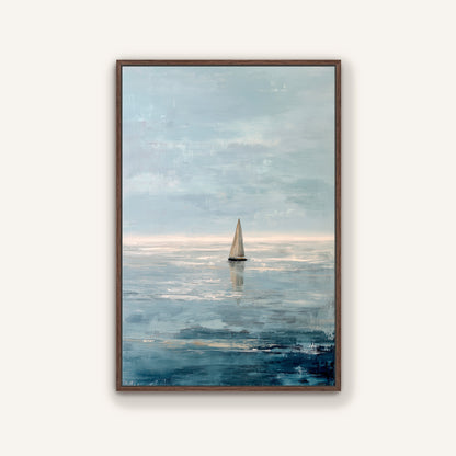a sailboat on the water, with a cloudy sky in the background.