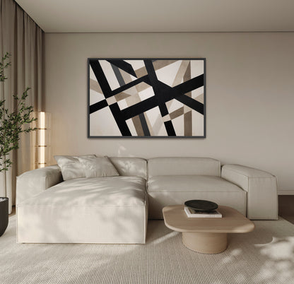 Axis canvas print with bold geometric lines in neutral tones above modern beige sofa in minimalist living room
