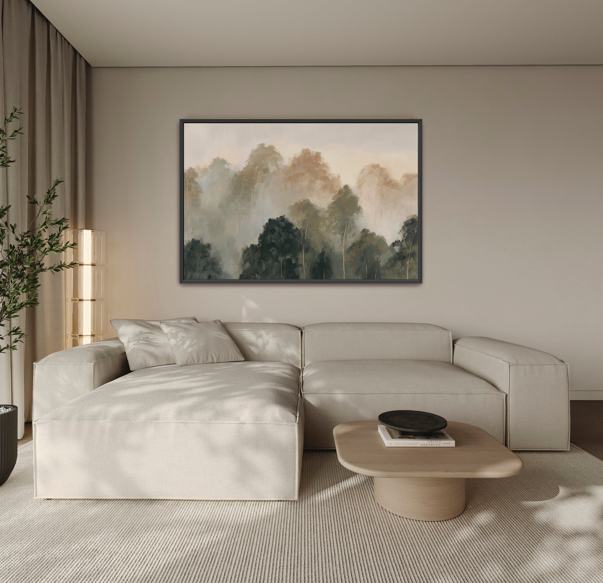 Fable Canvas Print hanging above beige sectional sofa in modern living room with misty layered treetop art in muted olive and ivory tones