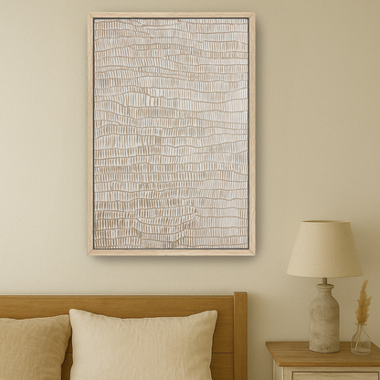 a serene bedroom scene with a bed, a nightstand, and a framed abstract artwork hanging on the wall above the bed.