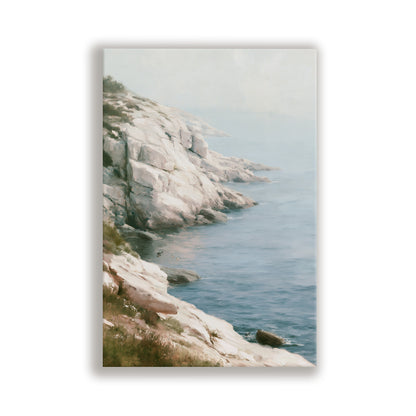 a rocky coastline with a calm, blue ocean in the background.