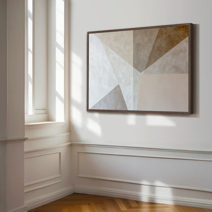 a large abstract painting hanging on a white wall in a room with a wooden floor.
