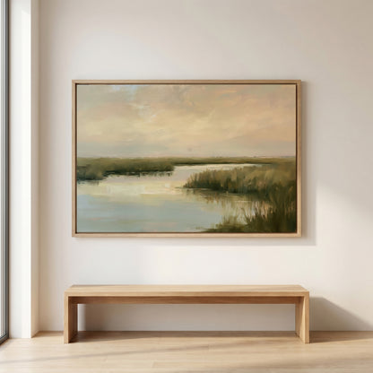 a large landscape painting hanging on a white wall above a wooden bench.