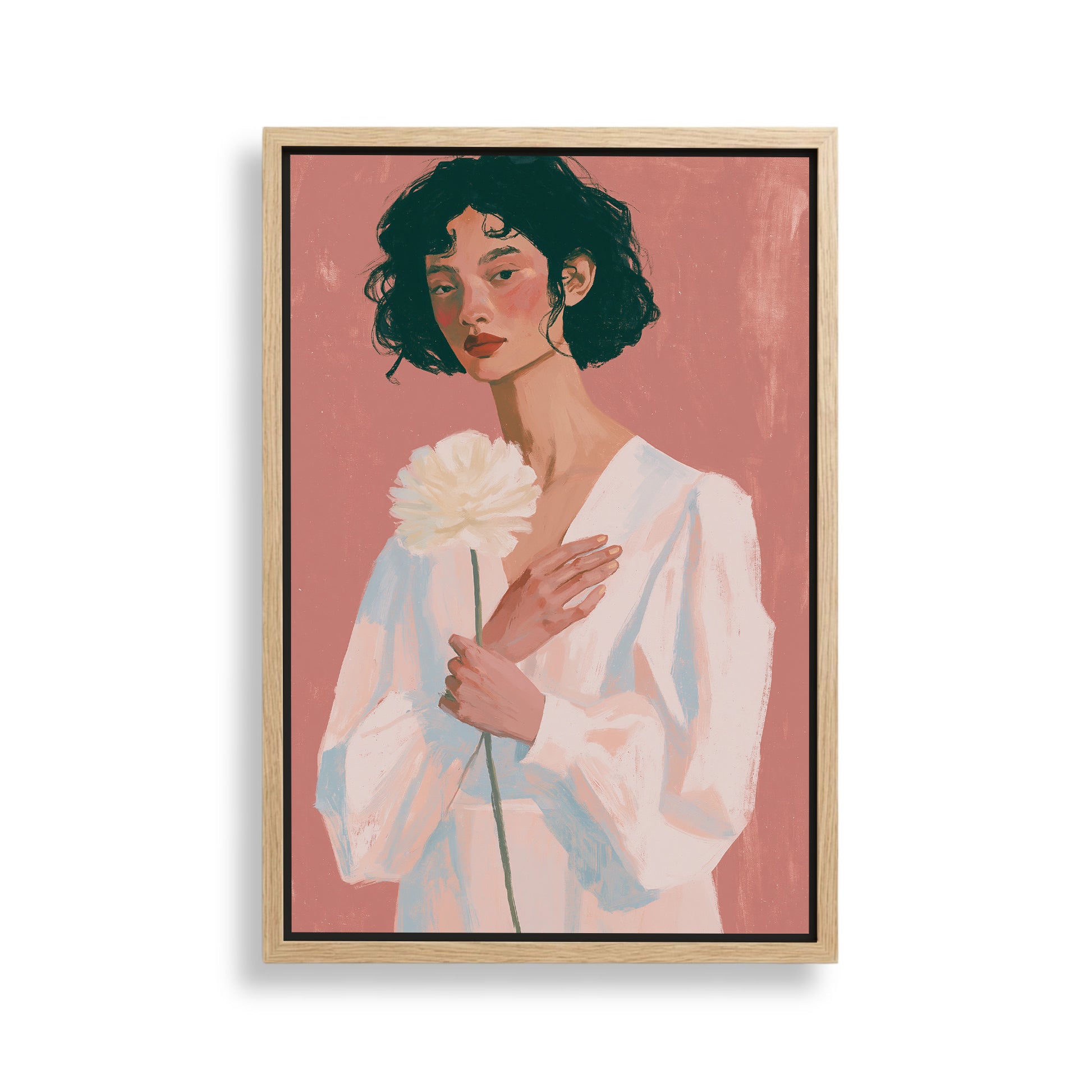 A woman with dark hair is holding a white flower in the image.