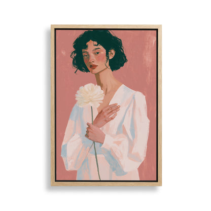 A woman with dark hair is holding a white flower in the image.