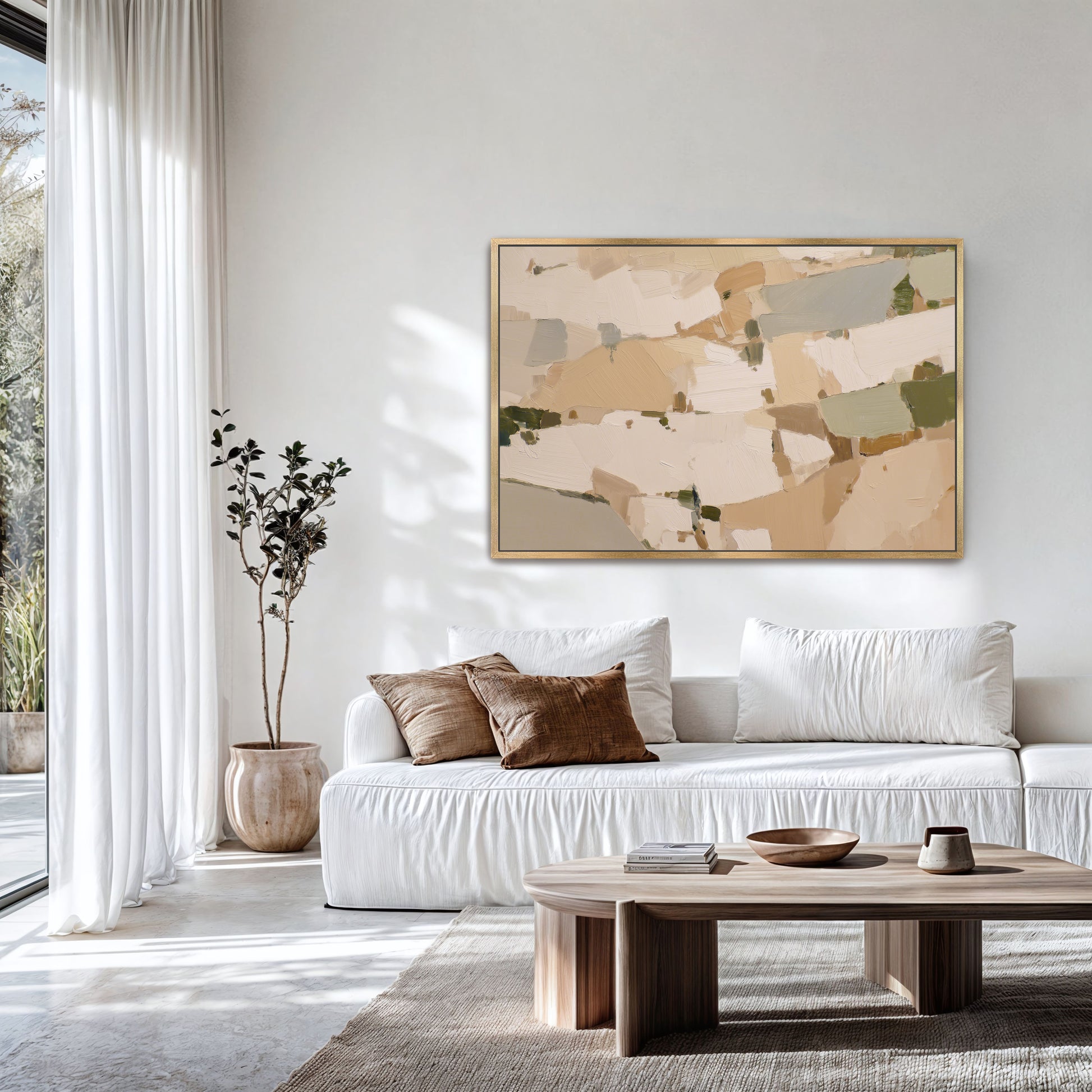 a modern living room with a white sofa, a wooden coffee table, and a large abstract painting on the wall.