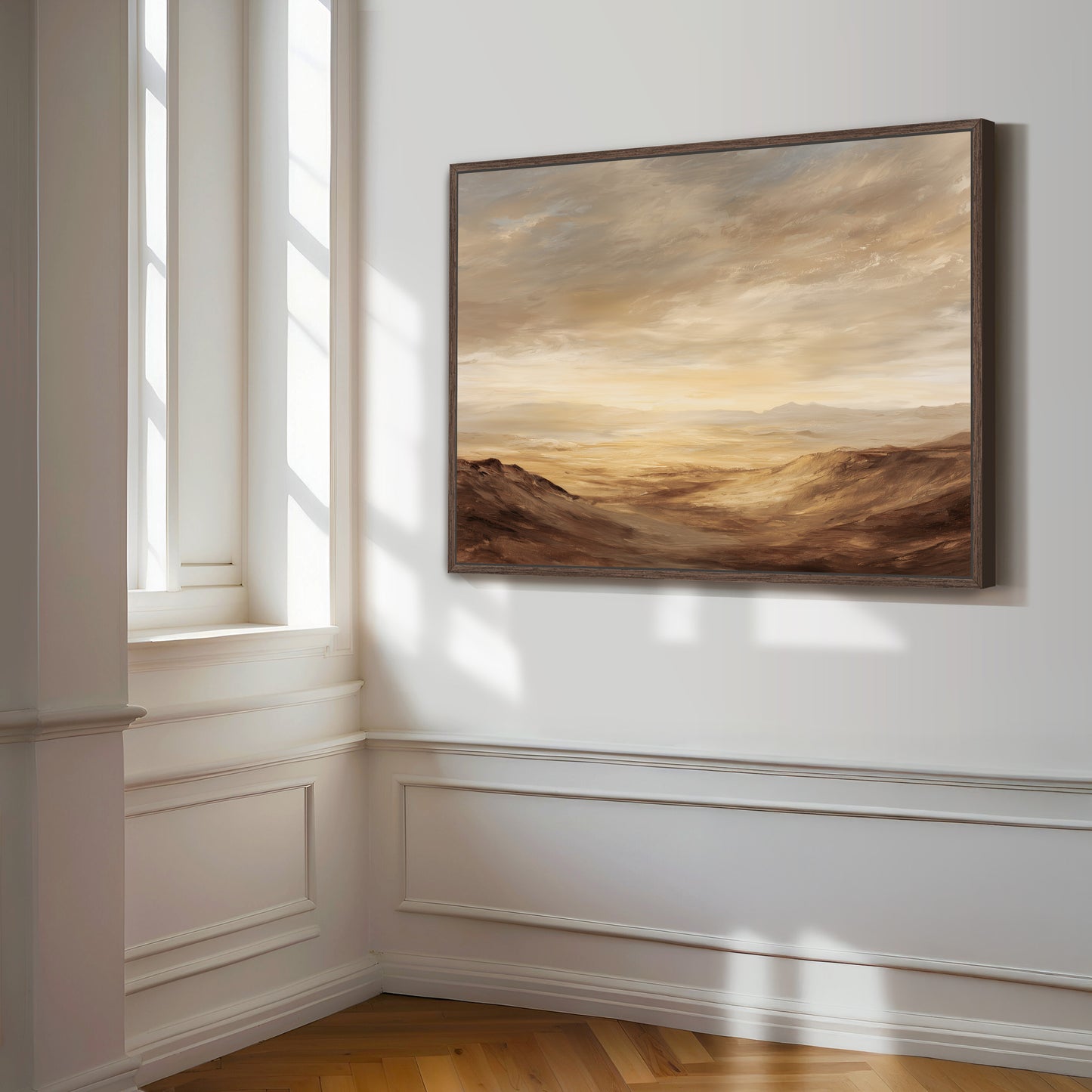 a large landscape painting hanging on a white wall in a room with a window.