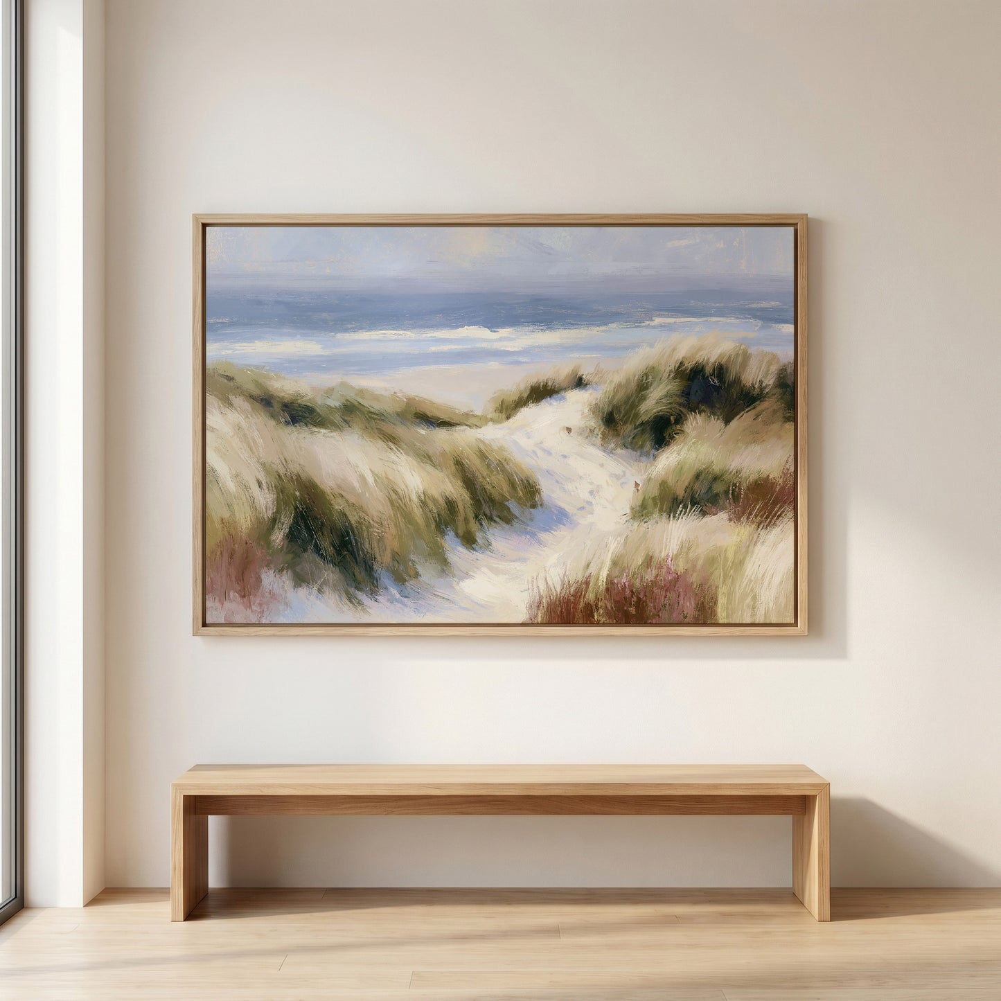 a large painting of a beach scene hanging on a wall above a wooden bench.