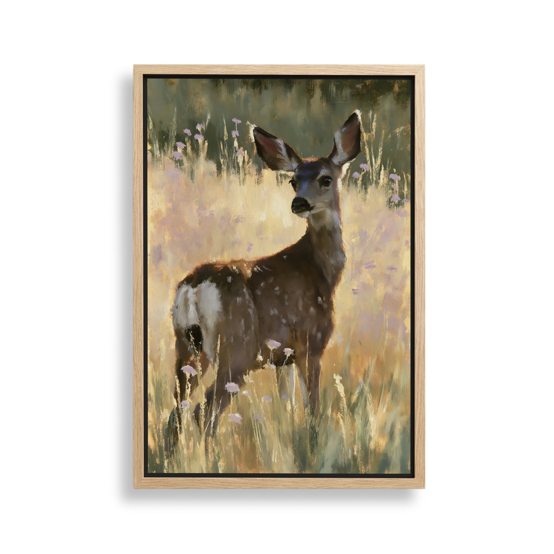 A deer standing in a field of tall grass and wildflowers.