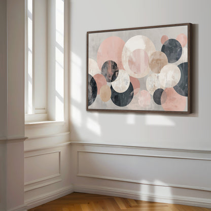 a large abstract painting hanging on a white wall in a room with a wooden floor.