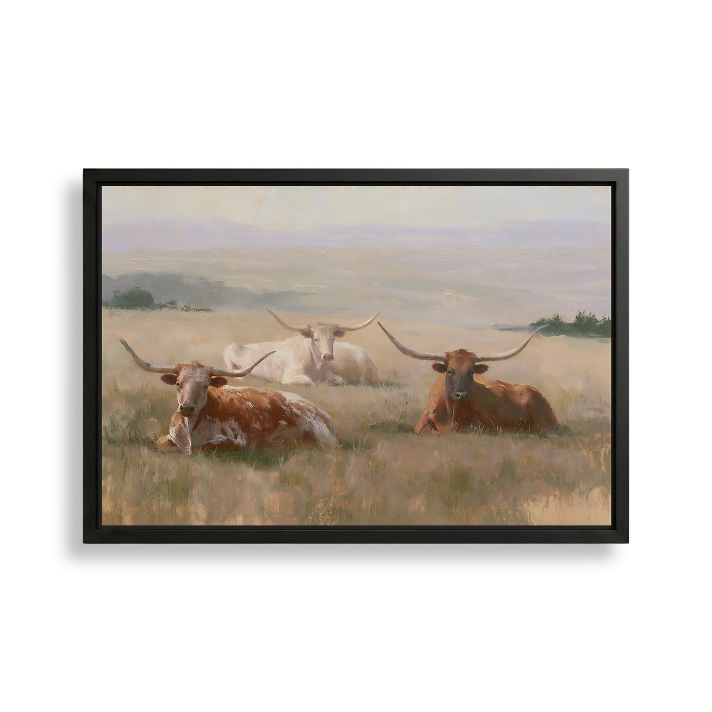 a group of four longhorn cattle resting in a grassy field.