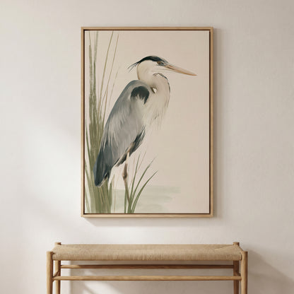 a large framed painting of a heron, a type of wading bird, hanging on a wall above a wooden bench.