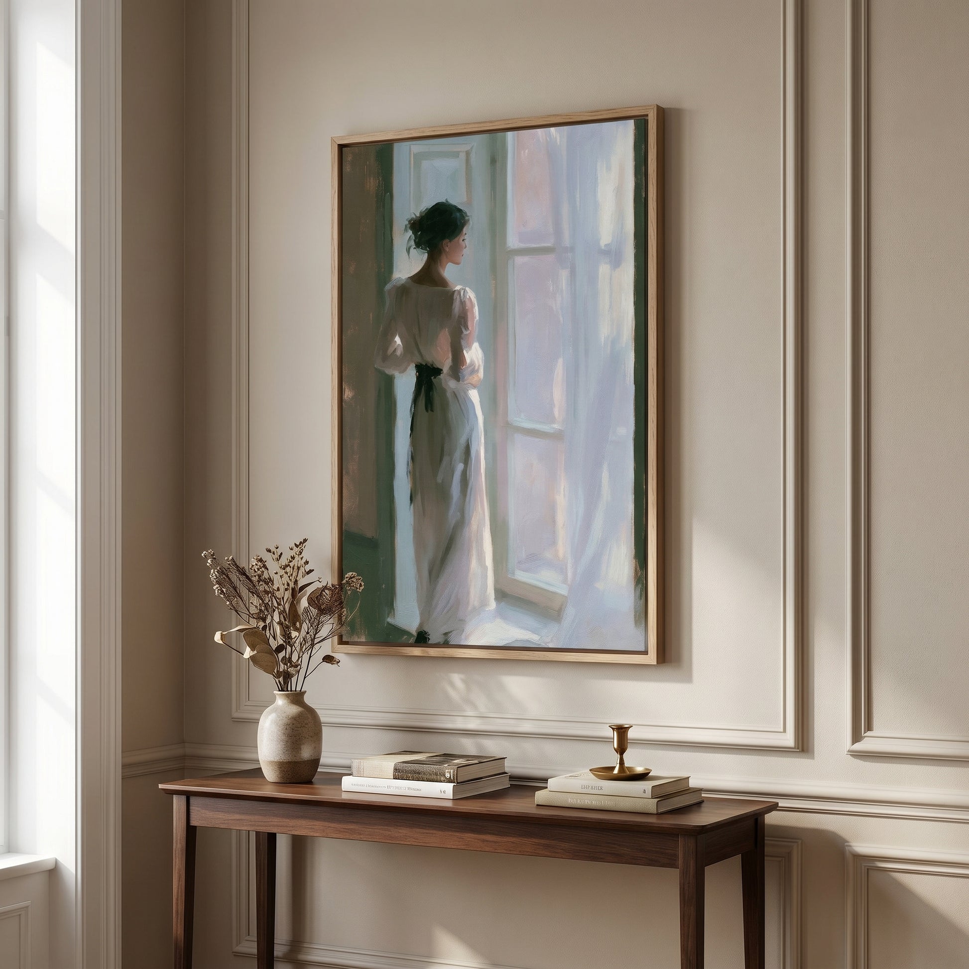 a painting of a woman in a white dress standing by a window, with a vase of dried flowers and a small table with books and a candle on it.