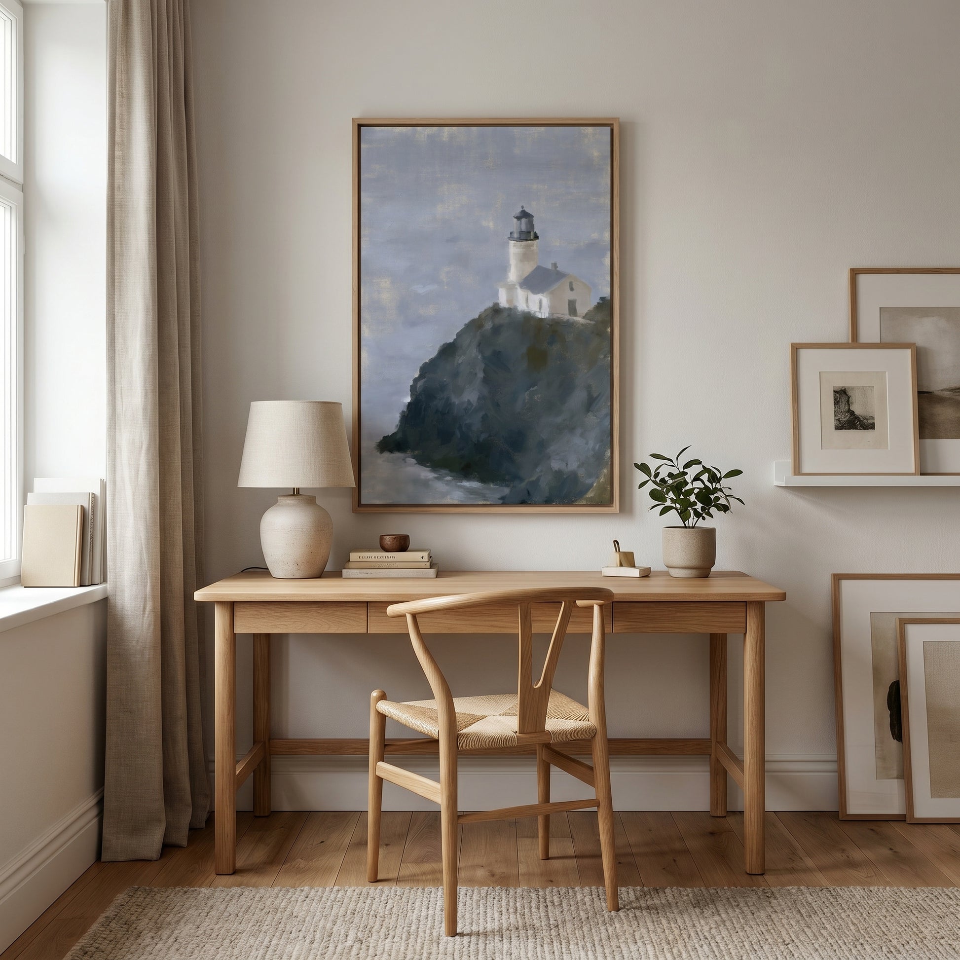 a serene workspace with a wooden desk, a lamp, a plant, and a framed painting of a lighthouse on the wall.
