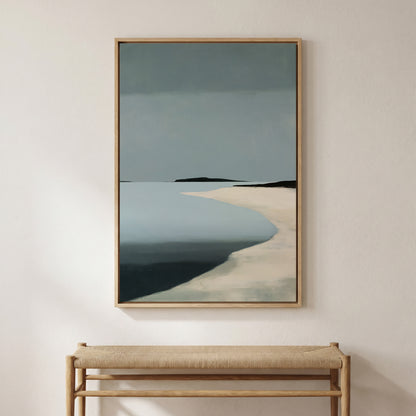 a large painting of a beach scene hanging on a wall above a wooden bench.