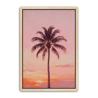 A framed painting depicting a palm tree silhouetted against a vibrant sunset sky.
