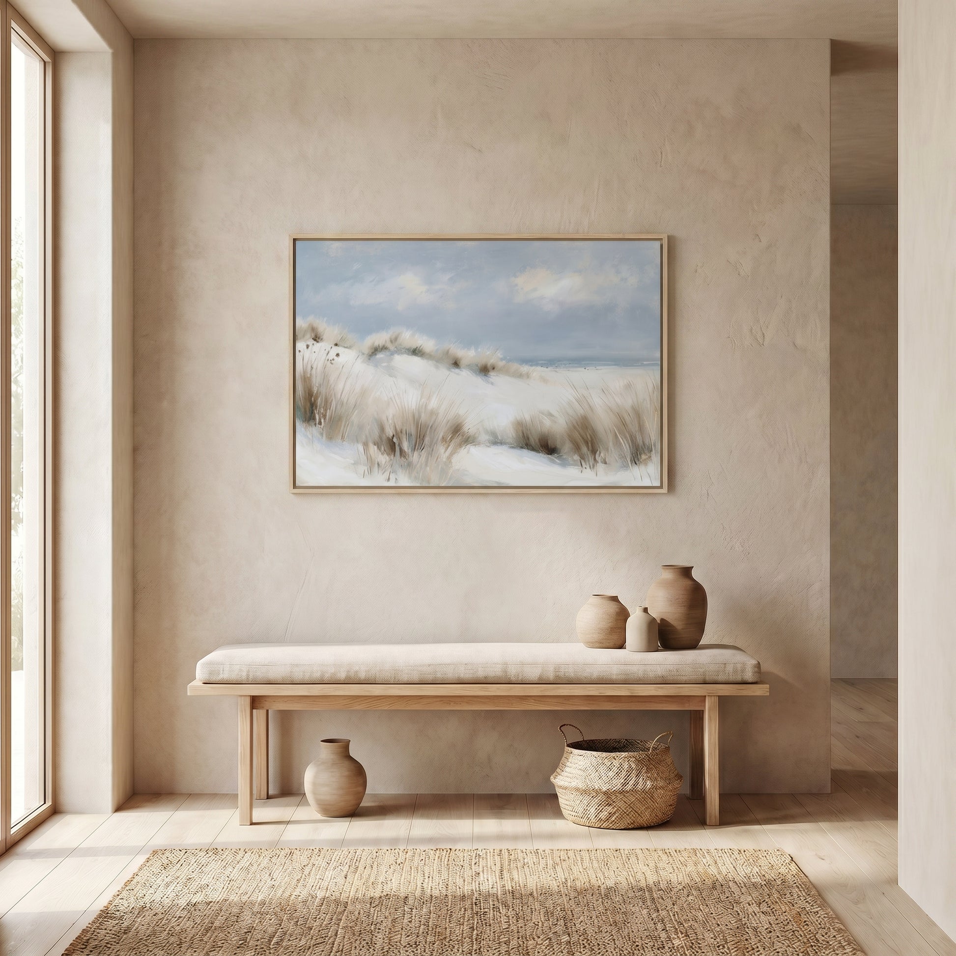 a serene and minimalist interior design with a large painting of a snowy landscape hanging on the wall above a wooden bench. The bench is positioned under a window, allowing natural light to illuminate the space. On the bench, there are three vases of varying sizes, and a woven basket is placed nearby. The overall color scheme of the room is neutral, with the painting and vases adding pops of color to the space.
