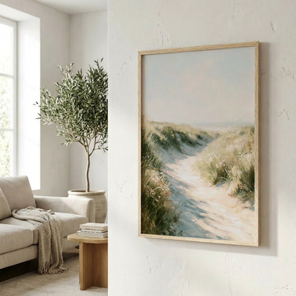 a serene living room with a large window, a comfortable sofa, and a framed painting of a beach scene hanging on the wall.
