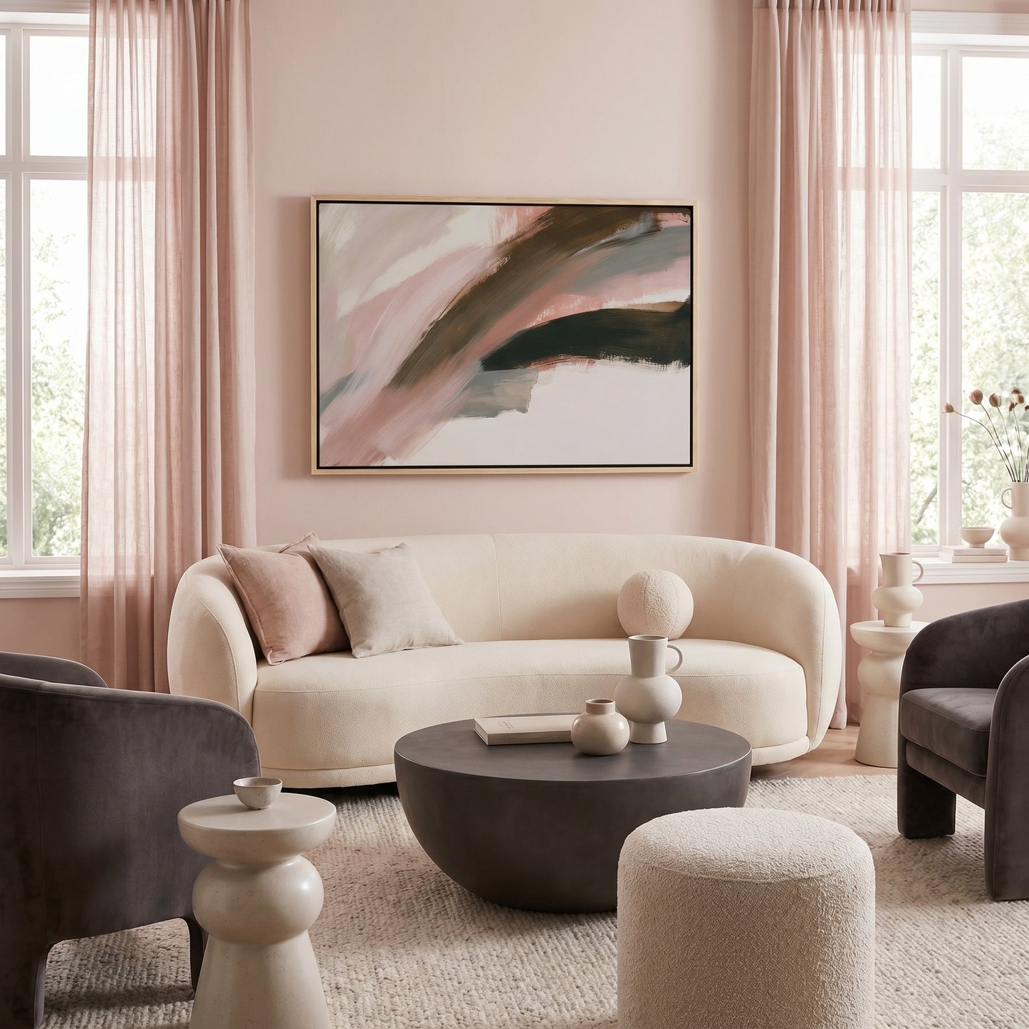 a modern living room with a large abstract painting on the wall, a white sofa, a gray armchair, a round coffee table, and a large window with sheer curtains.