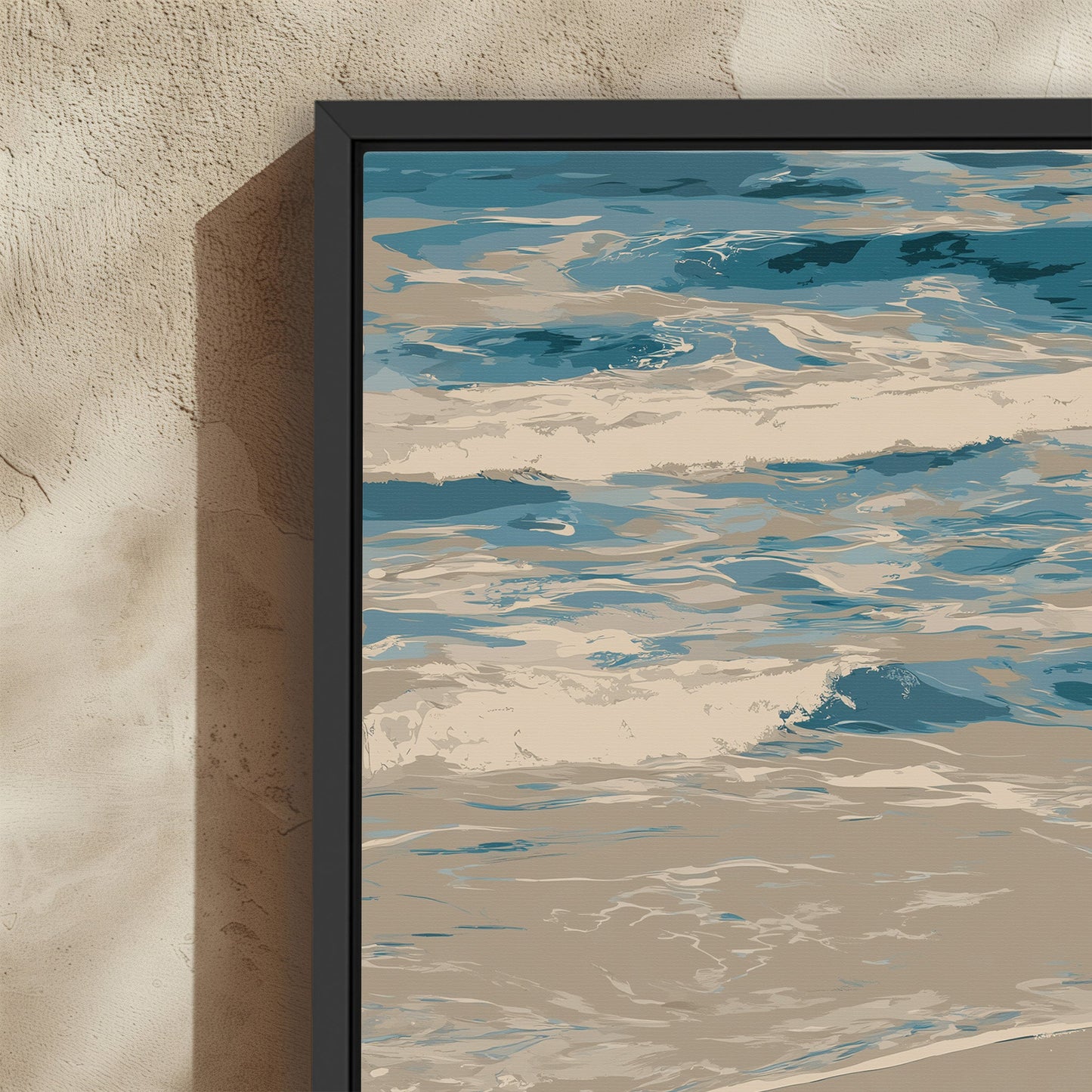 Marin Canvas Print abstract shoreline art in blue and neutral tones with black frame on textured wall