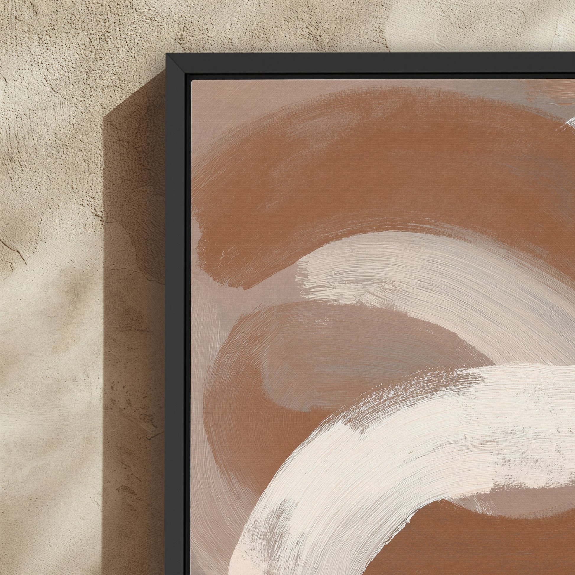 Current Canvas Print with abstract taupe, ivory, and sienna brushstrokes in a black frame on textured wall