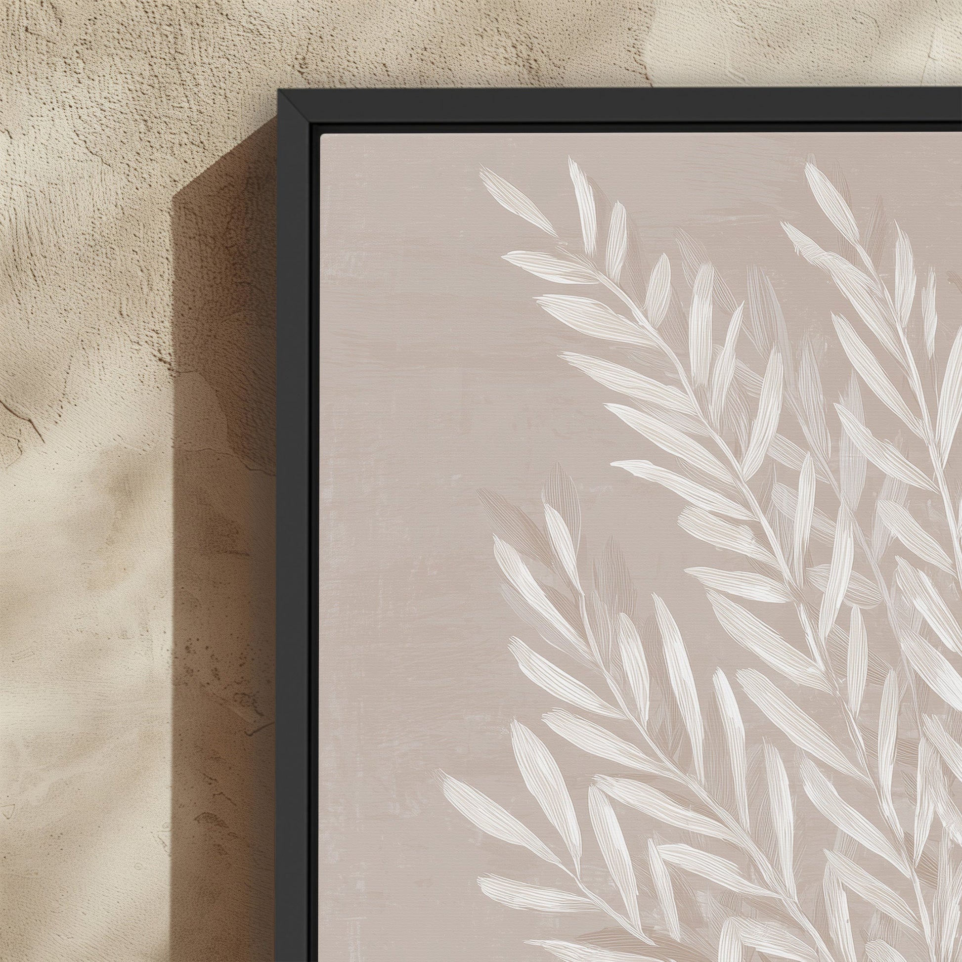 Whisper Canvas Print with slender ivory leaves on soft taupe background in black frame, modern botanical abstract wall art