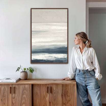 Syd Canvas Print minimalist seascape in ivory, sand, and indigo tones, framed and hanging above wood cabinet in modern interior