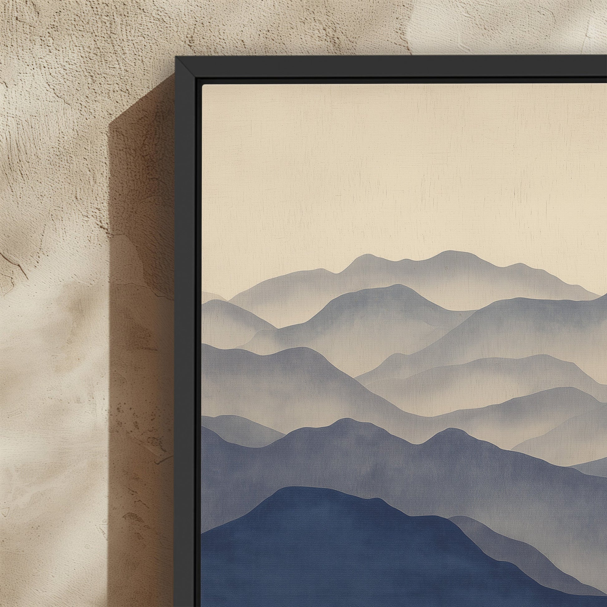 Veil canvas print featuring layered mountain silhouettes in indigo and beige tones with a black floating frame, minimalist landscape art.