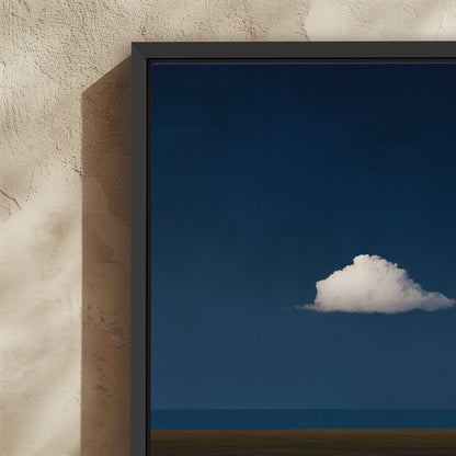 Nimbus Canvas Print featuring a solitary white cloud over a deep blue horizon in a modern black frame