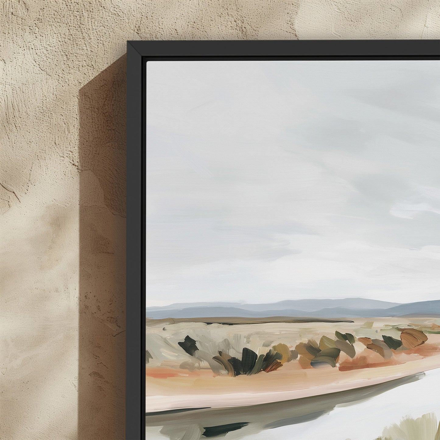 Mesa canvas print depicting a tranquil modern desert landscape with flowing river and muted earth tones, framed in black.