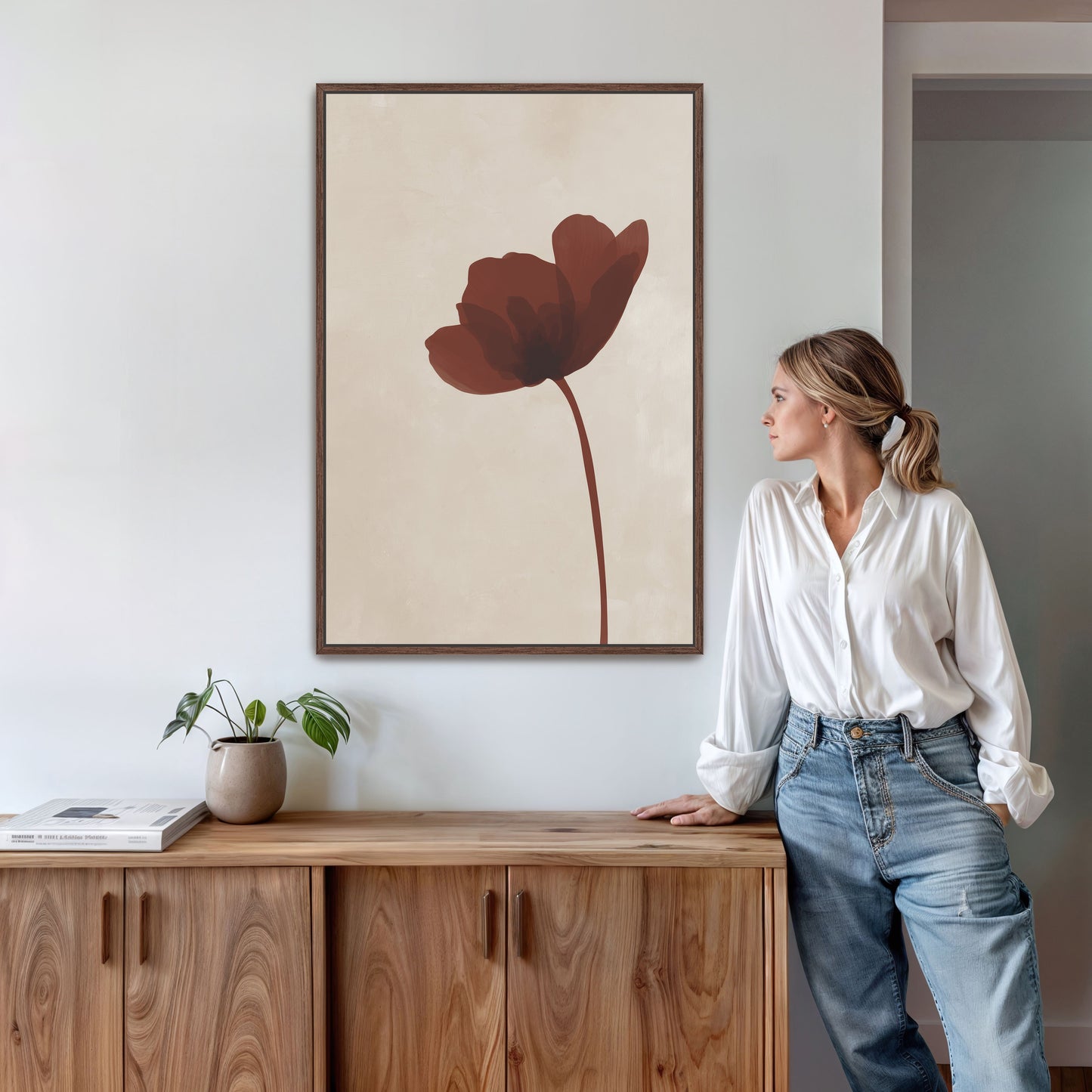 Minimalist Stem Canvas Print featuring a burgundy flower on a neutral background in a modern wooden frame