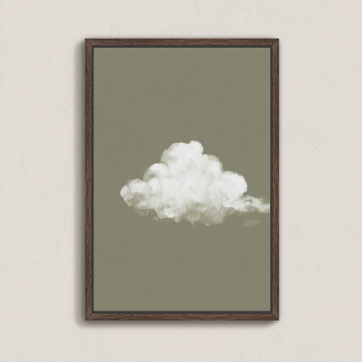 'Trace' canvas print featuring a single white cloud on a muted sage background in a wooden frame