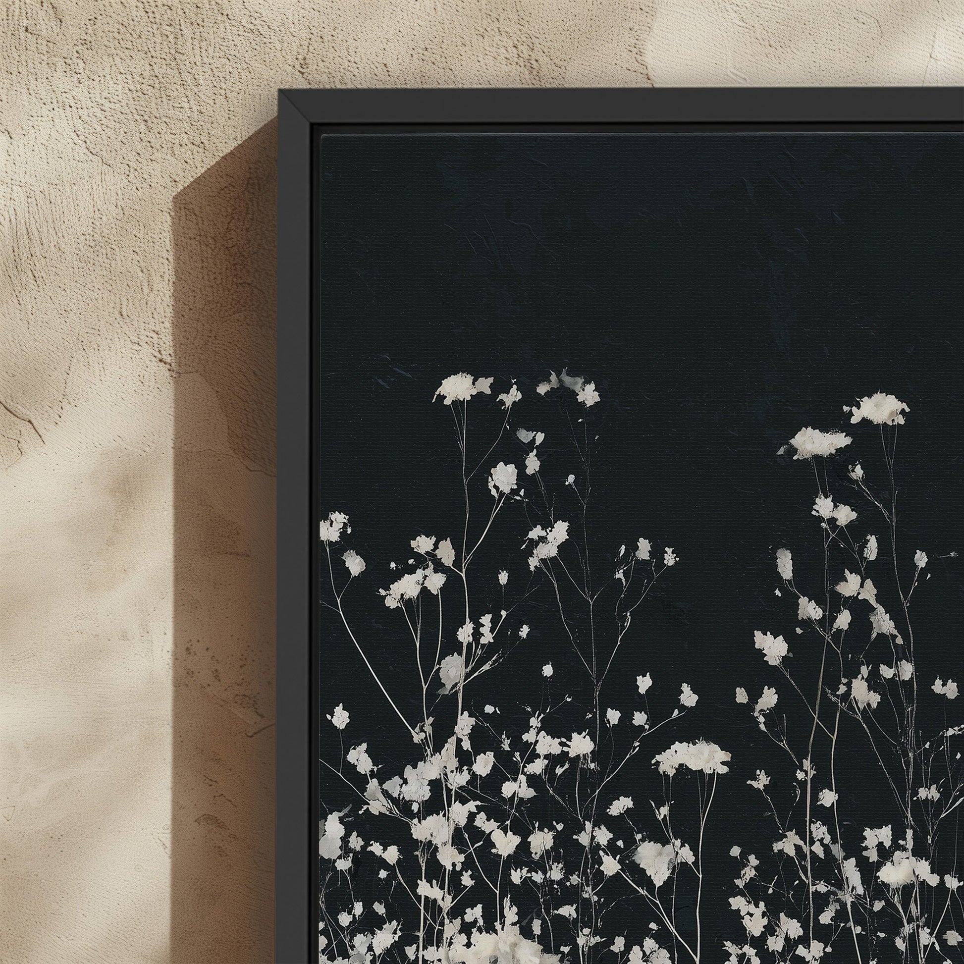 Noiré Canvas Wall Art with delicate white florals on deep charcoal background in black frame