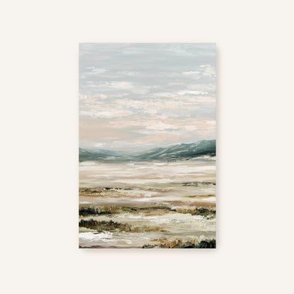 a serene landscape with a vast body of water, mountains in the distance, and a cloudy sky above.