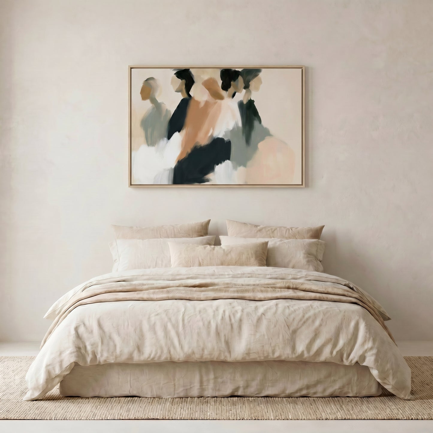 a large bed with a beige comforter and pillows, set against a plain white wall. Above the bed, there is a framed abstract painting hanging on the wall.