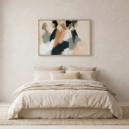a large bed with a beige comforter and pillows, set against a plain white wall. Above the bed, there is a framed abstract painting hanging on the wall.