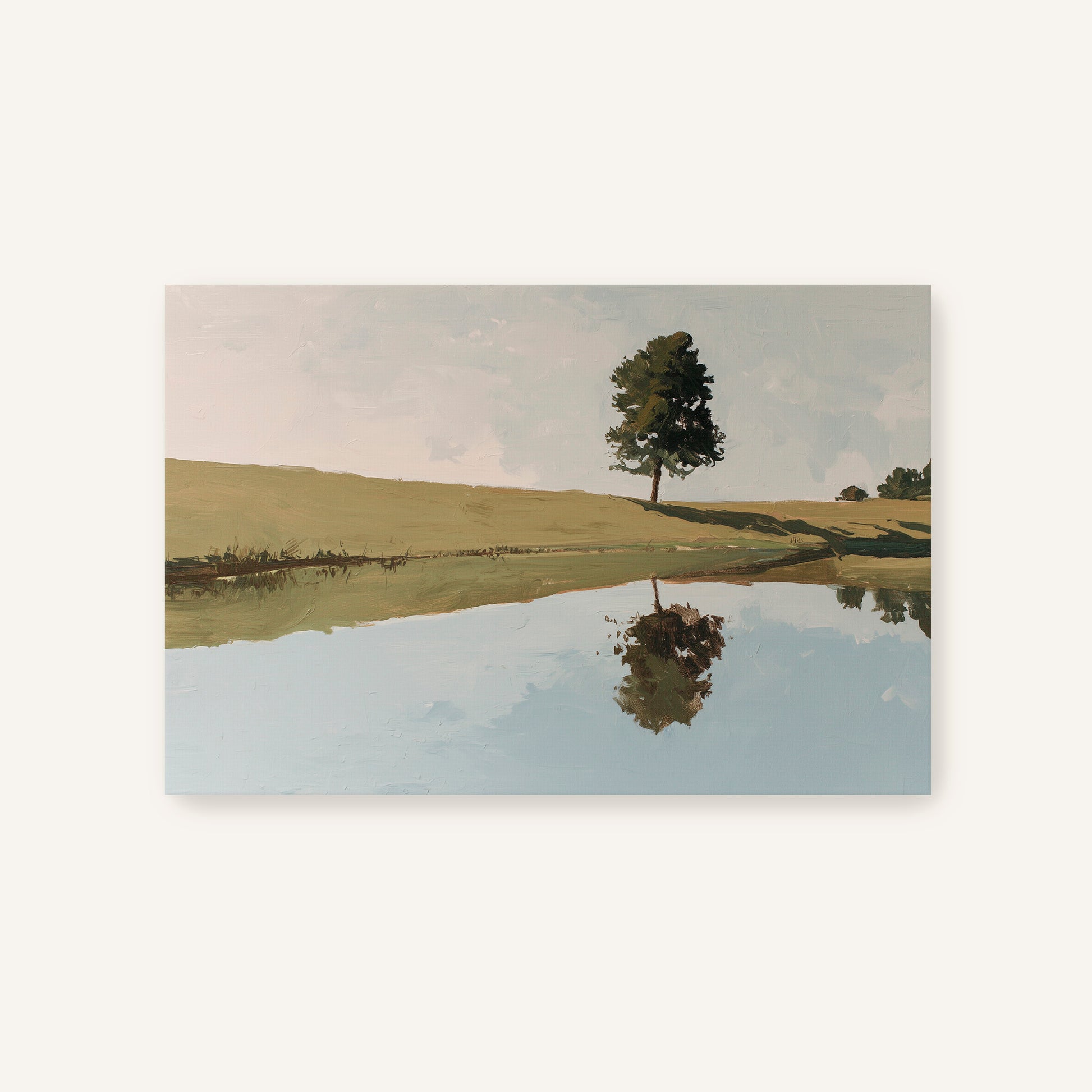 a serene landscape with a lone tree standing in a field, its reflection mirrored in the still water below.