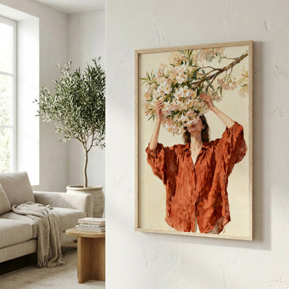 a woman in a red blouse standing in a living room, with a potted plant and a framed painting of a woman with flowers in her hair hanging on the wall.
