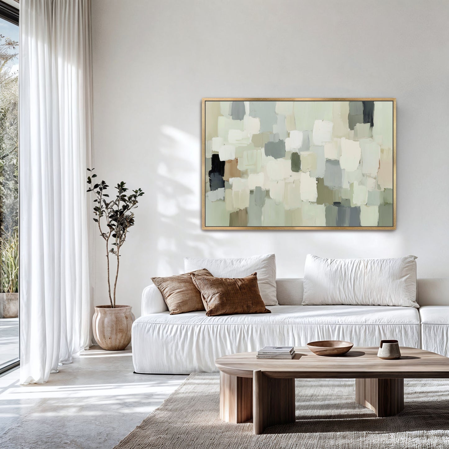 a modern living room with a large abstract painting on the wall, a white sofa with brown throw pillows, and a wooden coffee table.