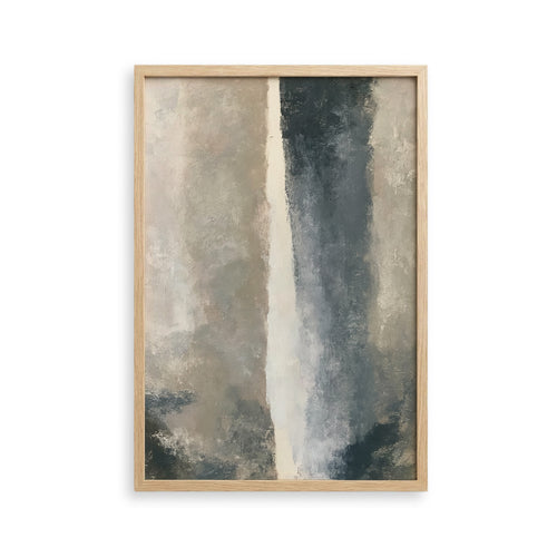 The image is a framed abstract painting with a predominantly gray and white color palette. The painting features a vertical line running through the center, creating a sense of movement and depth. The frame is made of wood and has a simple, clean design.
