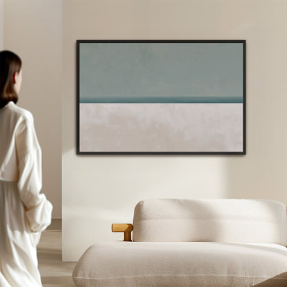 Minimalist Azure canvas print with tranquil sea and sky in muted sage and sand hues above beige sofa in modern living room